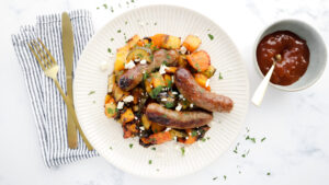 steam one pan sausage and vegetable tray bake with gravy