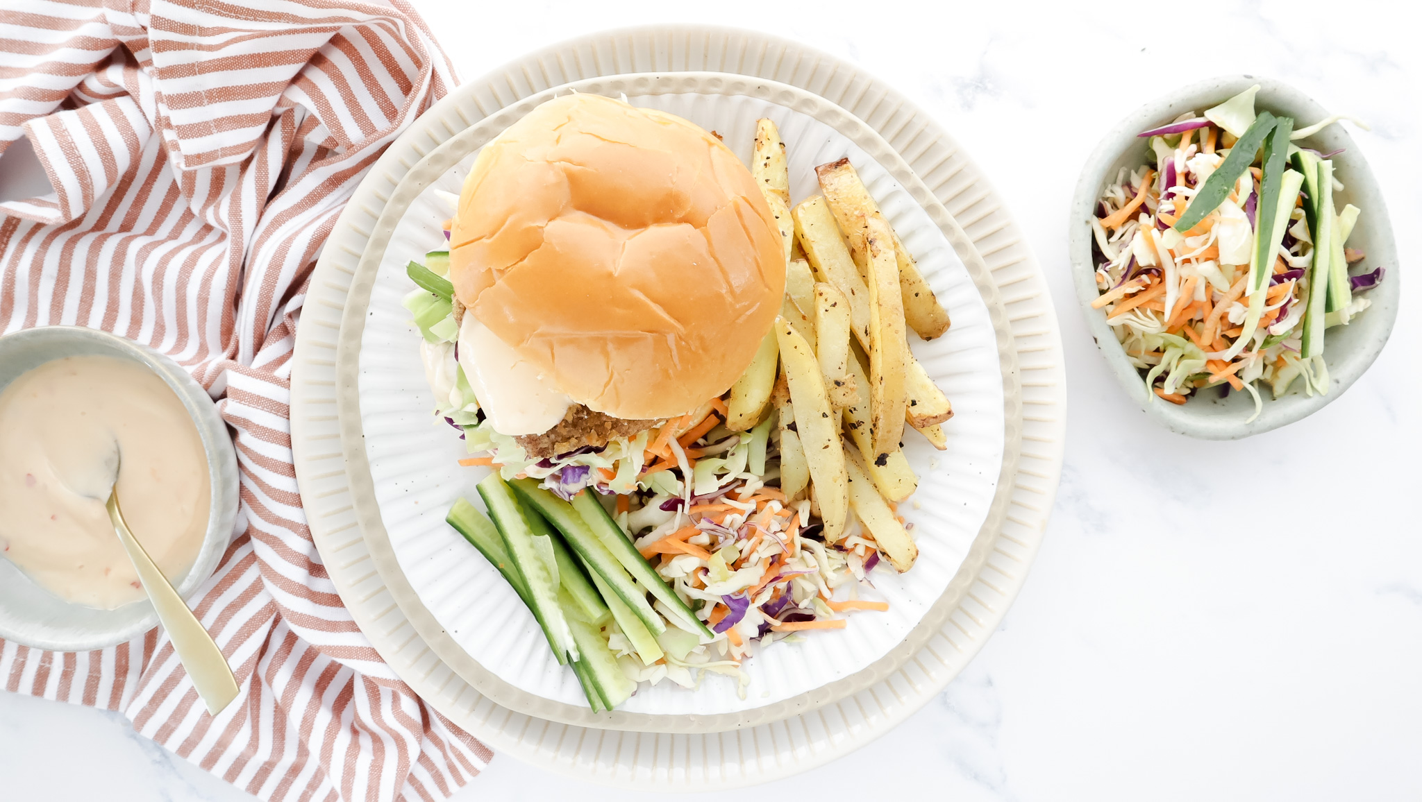 Asian-style crispy chicken burgers with fries & Asian slaw recipe