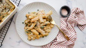 Creamy chicken & pasta bake with caramelised onion & golden crumb recipe
