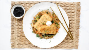 Crumbed hoki with stir-fry rice & Japanese mayo recipe