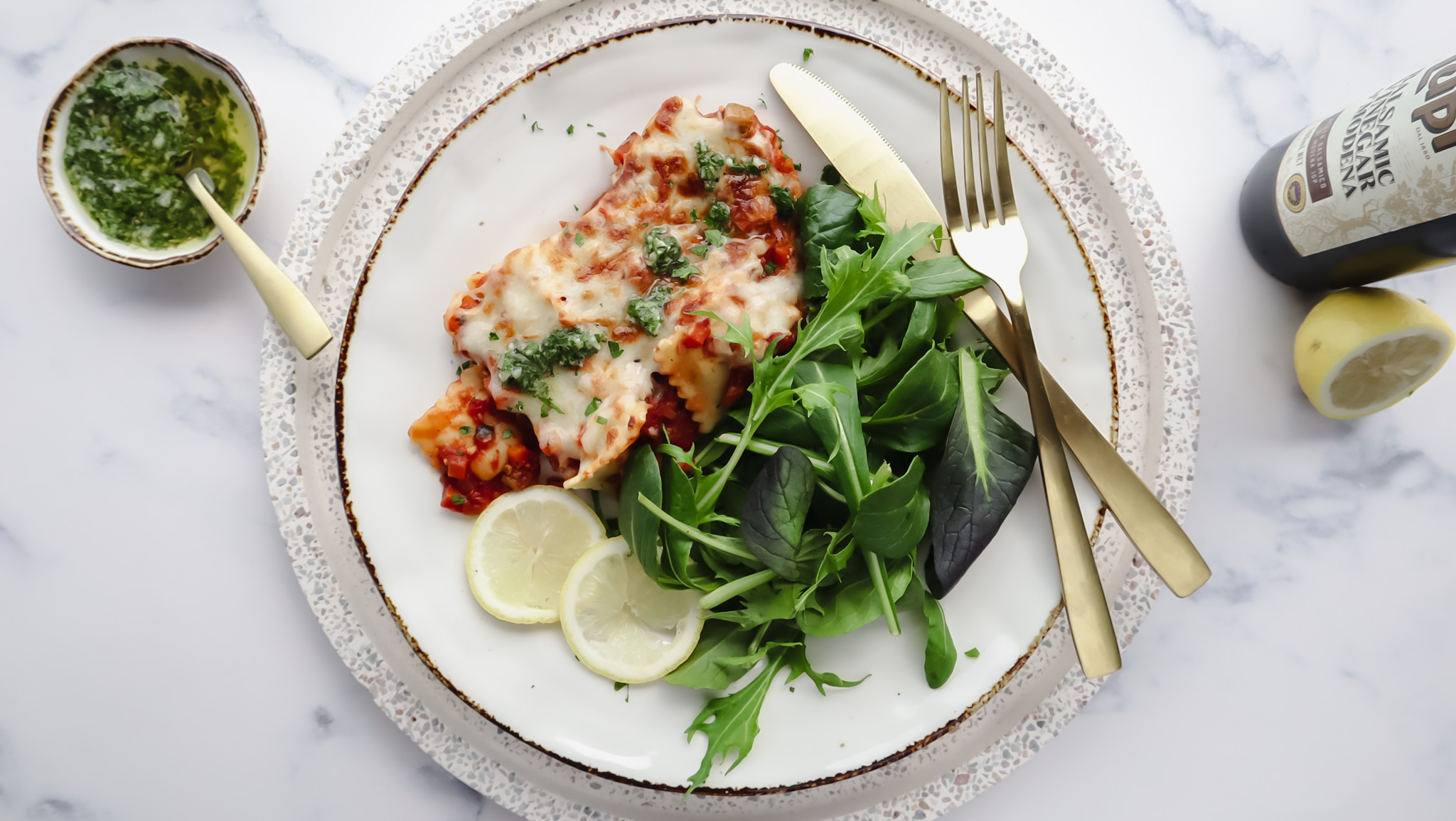 Italian tomato ravioli bake with cheese, gremolata & mesclun recipe