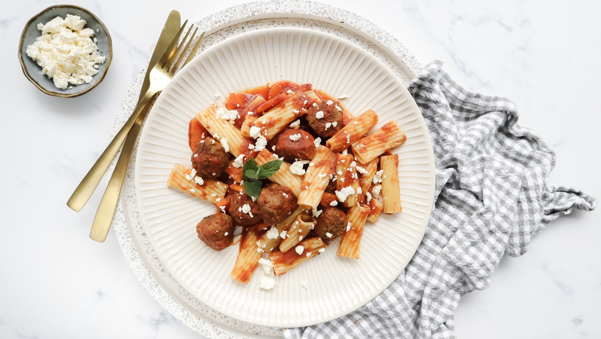 Lamb & feta meatballs with pasta & tomato sauce recipe