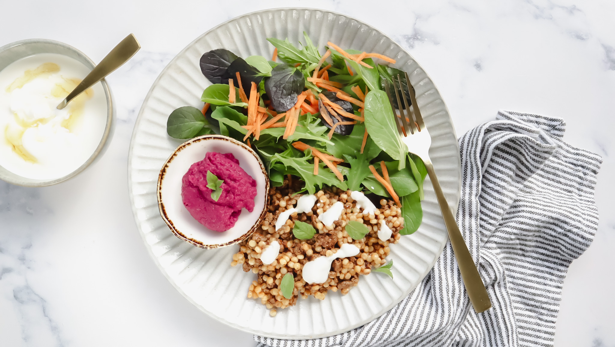 Moroccan beef couscous salad with beet hummus & honey yoghurt drizzle recipe