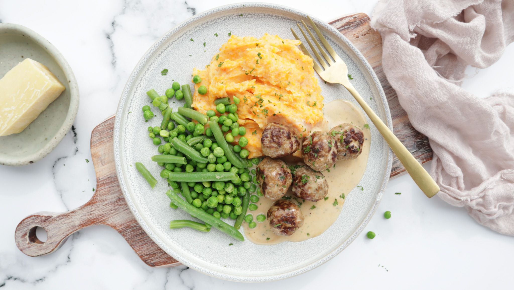 Moroccan lamb meatballs in creamy parsley sauce with veggie mash & greens recipe