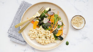Smoky mac’n’cheese with orange & almond mesclun recipe