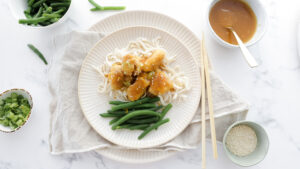 Sticky orange chicken with noodles & green beans recipe