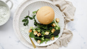 Tzatziki & lamb burger with sweet potato & cucumber salad