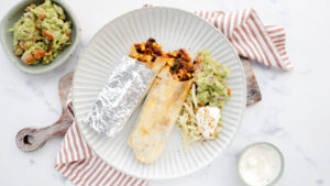 Veggie burrito with cheese, guacamole & sour cream recipe