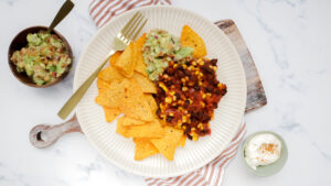 Veggie nachos with corn chips, guacamole & sour cream recipe