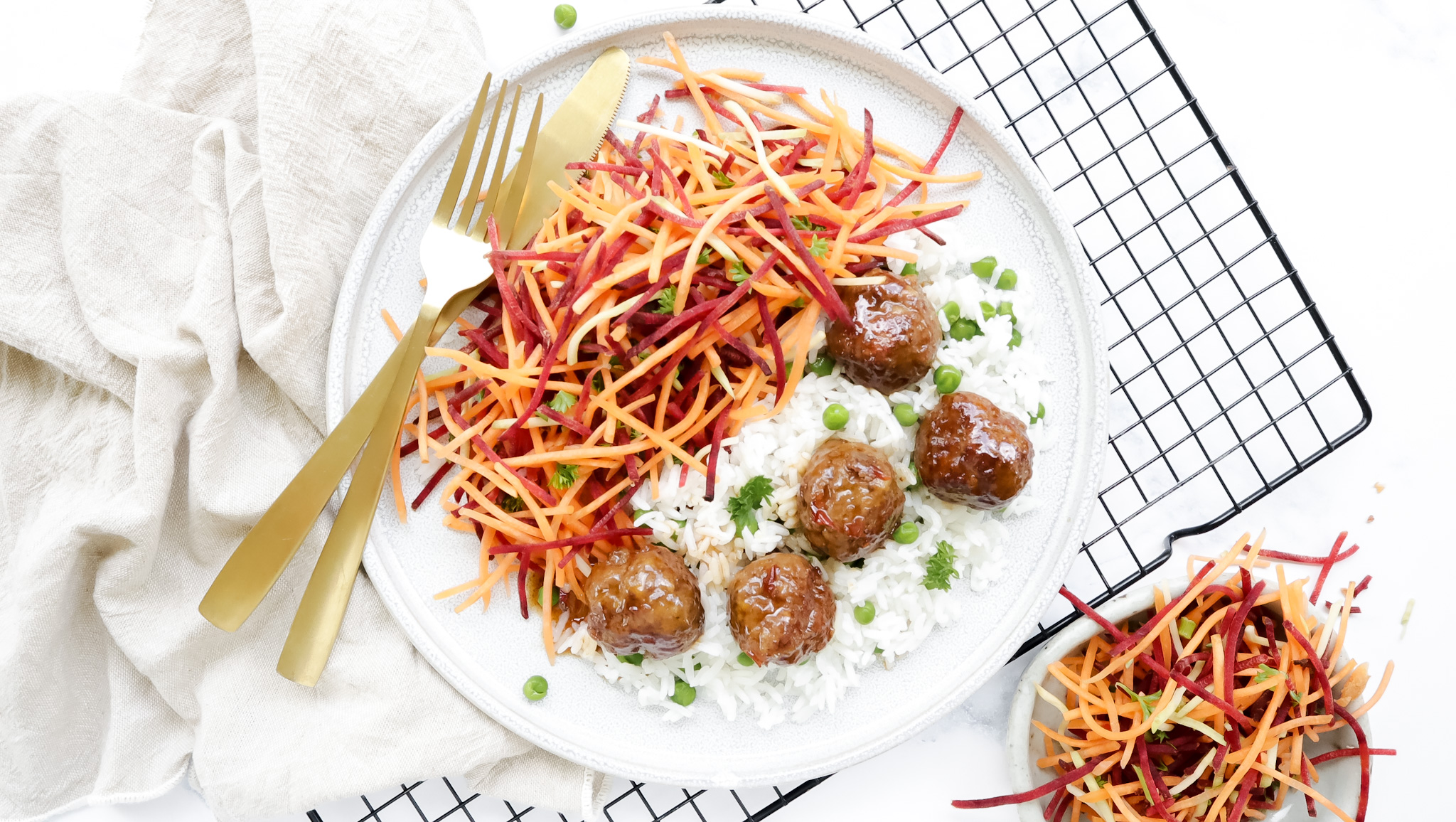 Vietnamese sticky beef meatballs with pea rice & asian slaw recipe