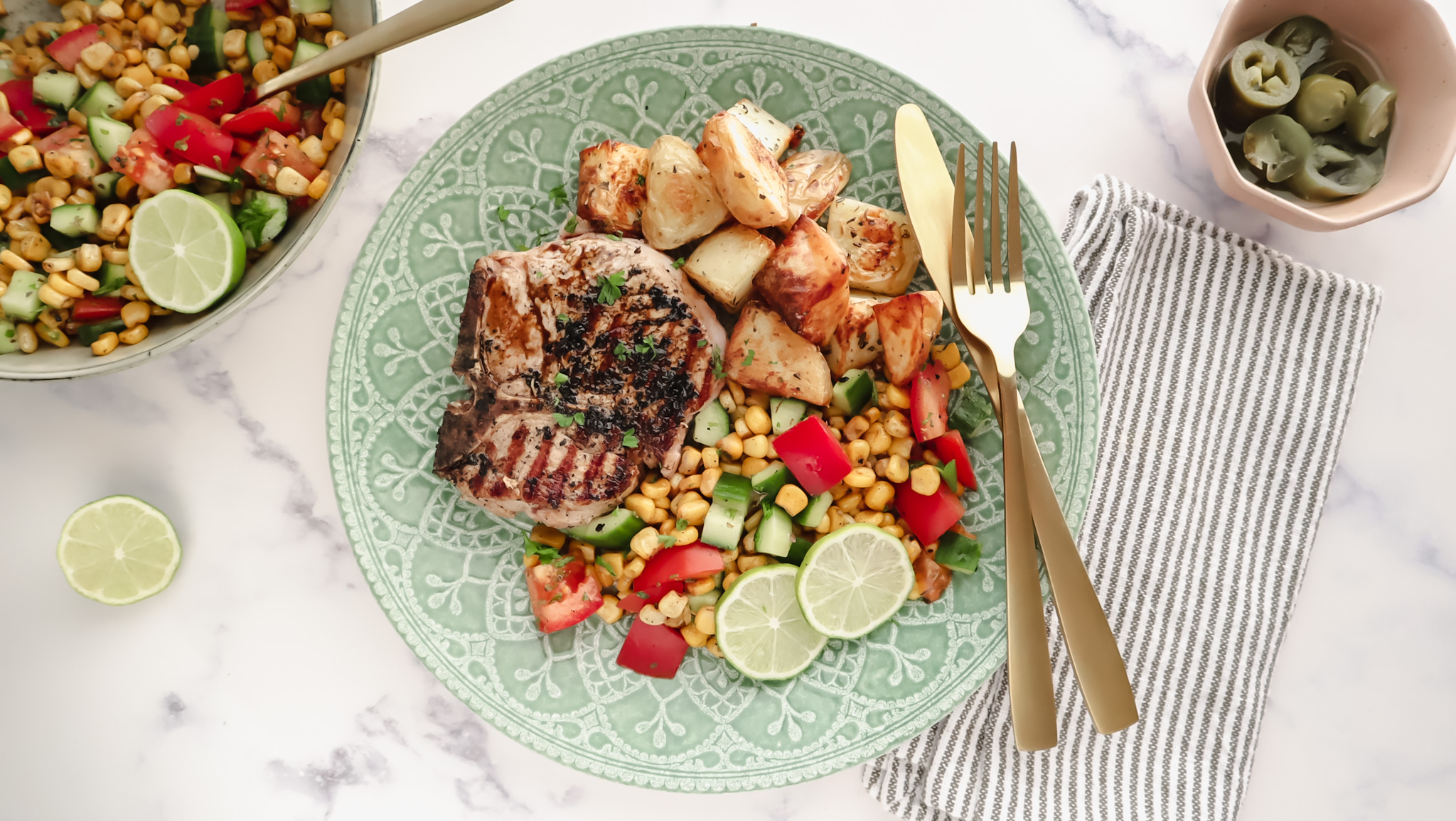 Grilled pork with corn & tomato salsa & potato roasties recipe