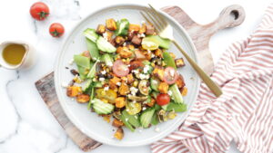 Roasted corn cob salad with feta, basil pesto & walnuts recipe