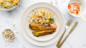 Thai fish with mango slaw, rice, sweet chilli sauce & cashews