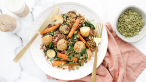 Crispy bacon, vegetable roasties & feta seeded salad recipe