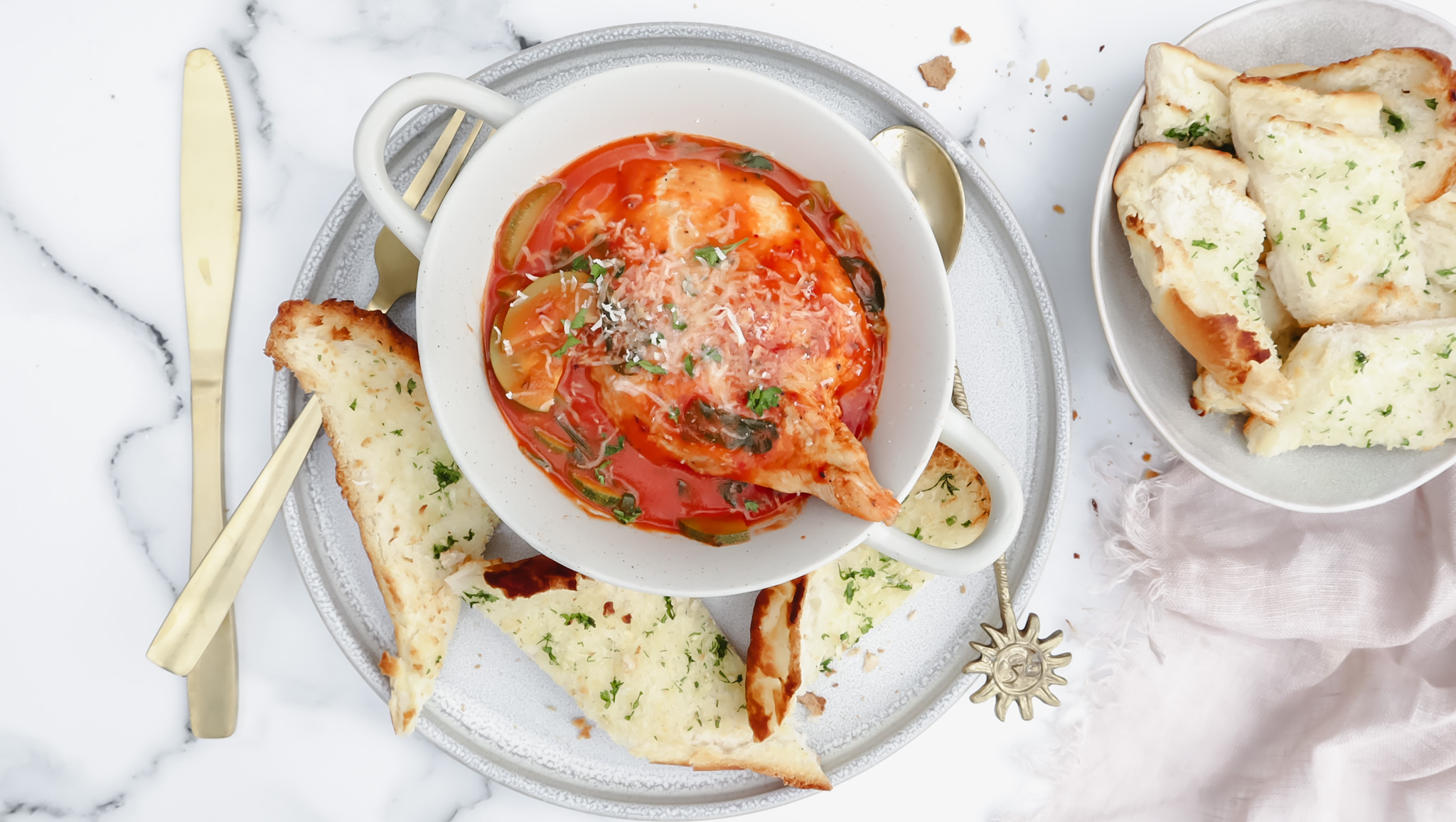 Creamy tomato & herb chicken with mash & garlic bread recipe