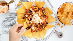 Easy cheesy chicken nachos with corn chips & sour cream recipe