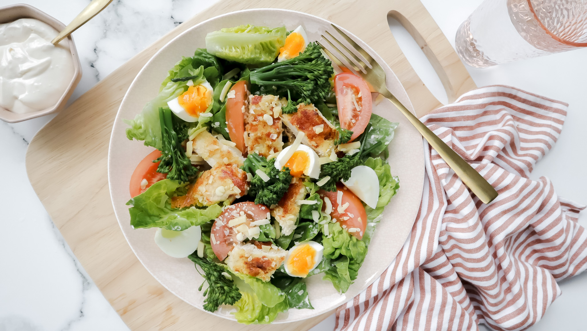 Parmesan crumbed chicken with easy Caesar style salad recipe