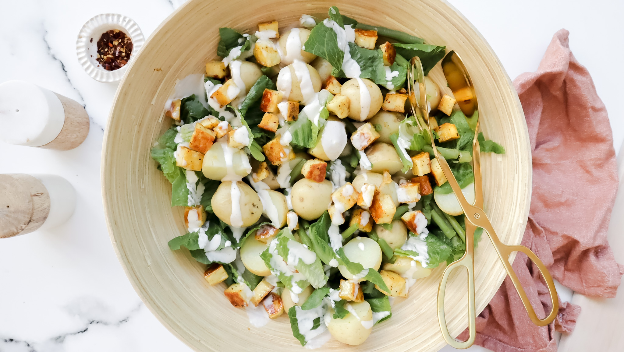 Potato & bean salad with haloumi, lettuce, avocado & Caesar dressing recipe
