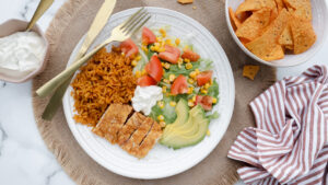 Quick Mexican chicken salad with rice & corn chips recipe