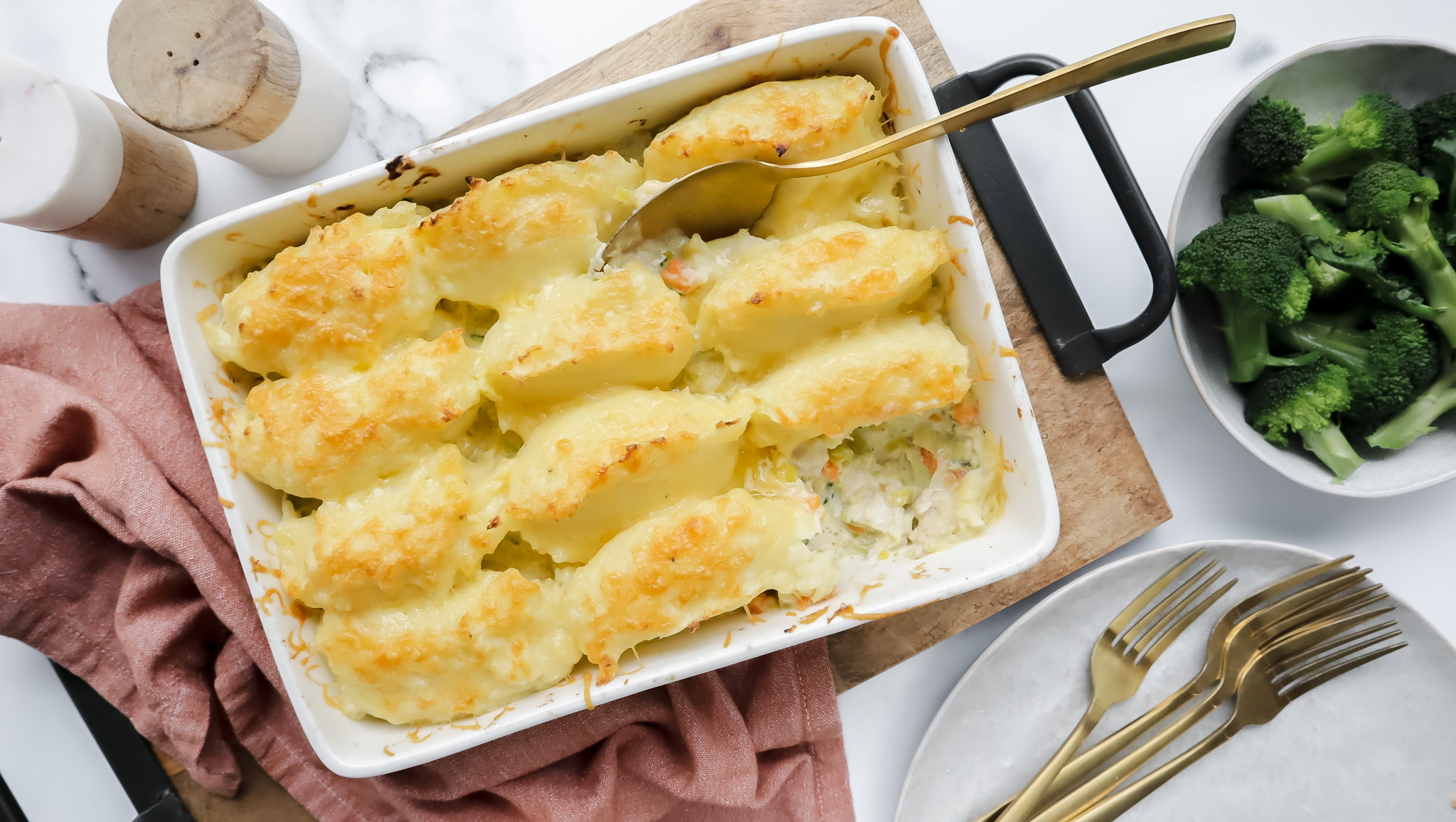 Creamy fish & veggie pie with cheesy potato top & steamed greens recipe