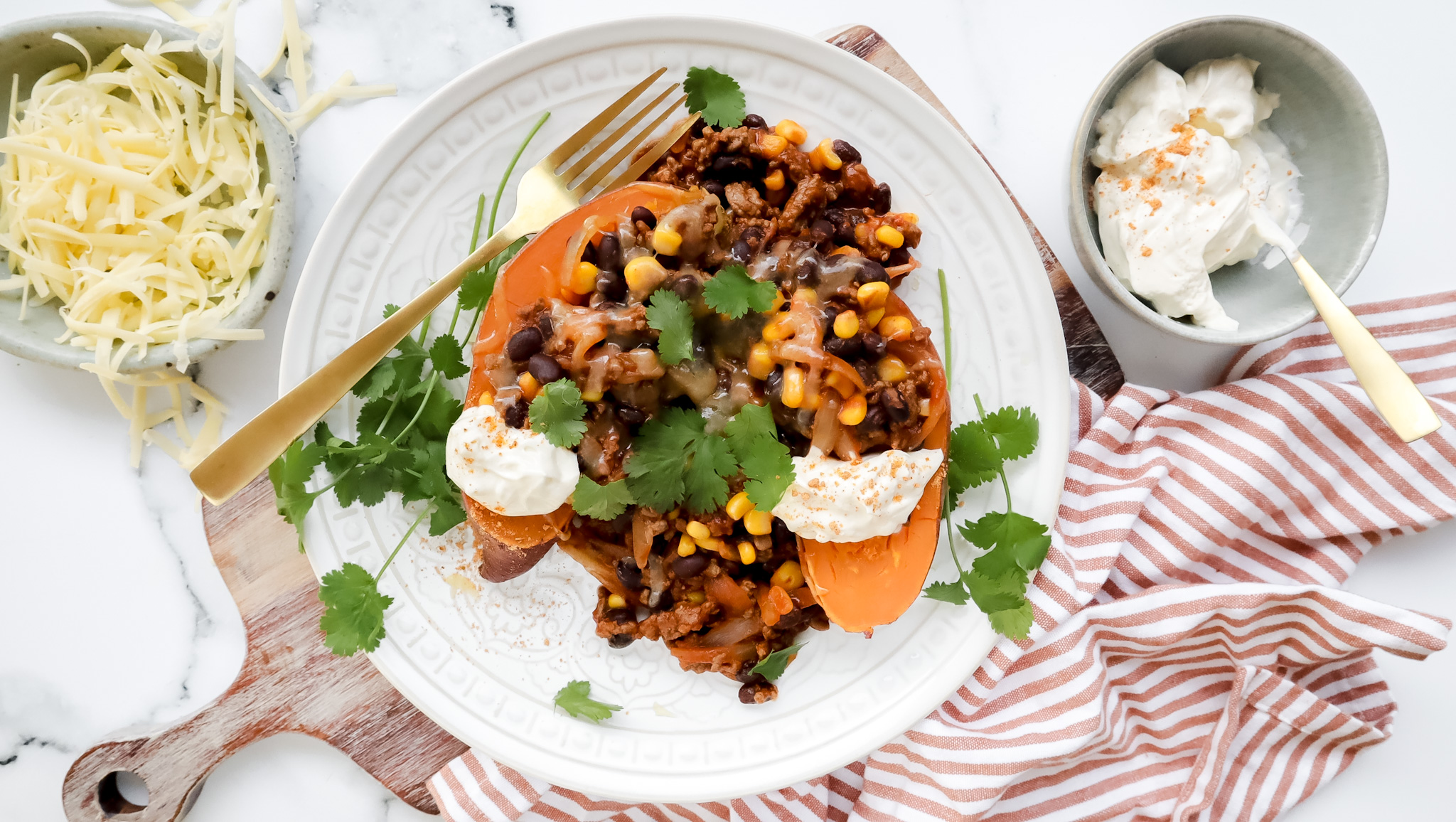 Mexican beef loaded sweet potato with cheese & sour cream recipe