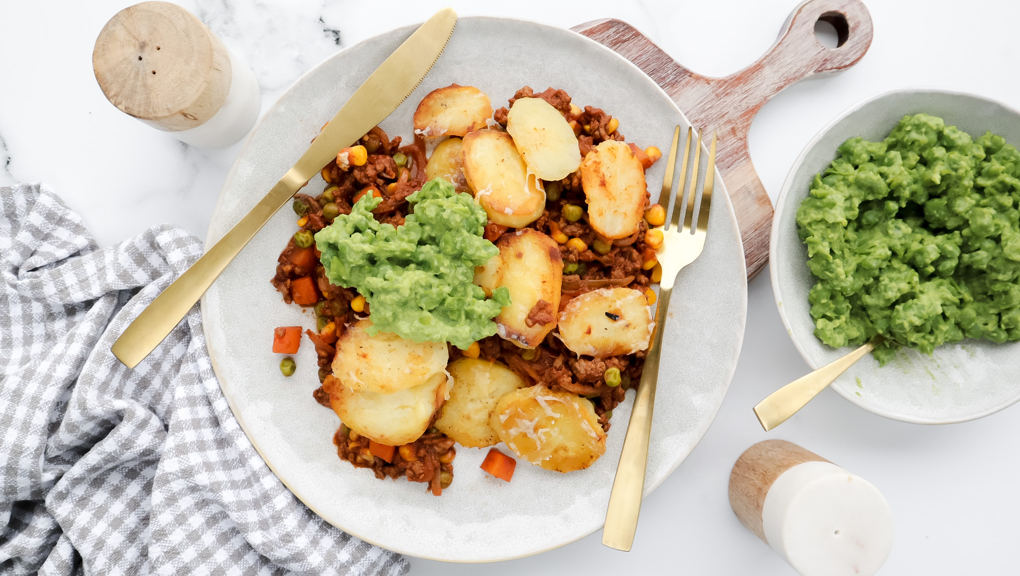 Savoury lamb pie with cheesy fried potato top & mushy peas recipe