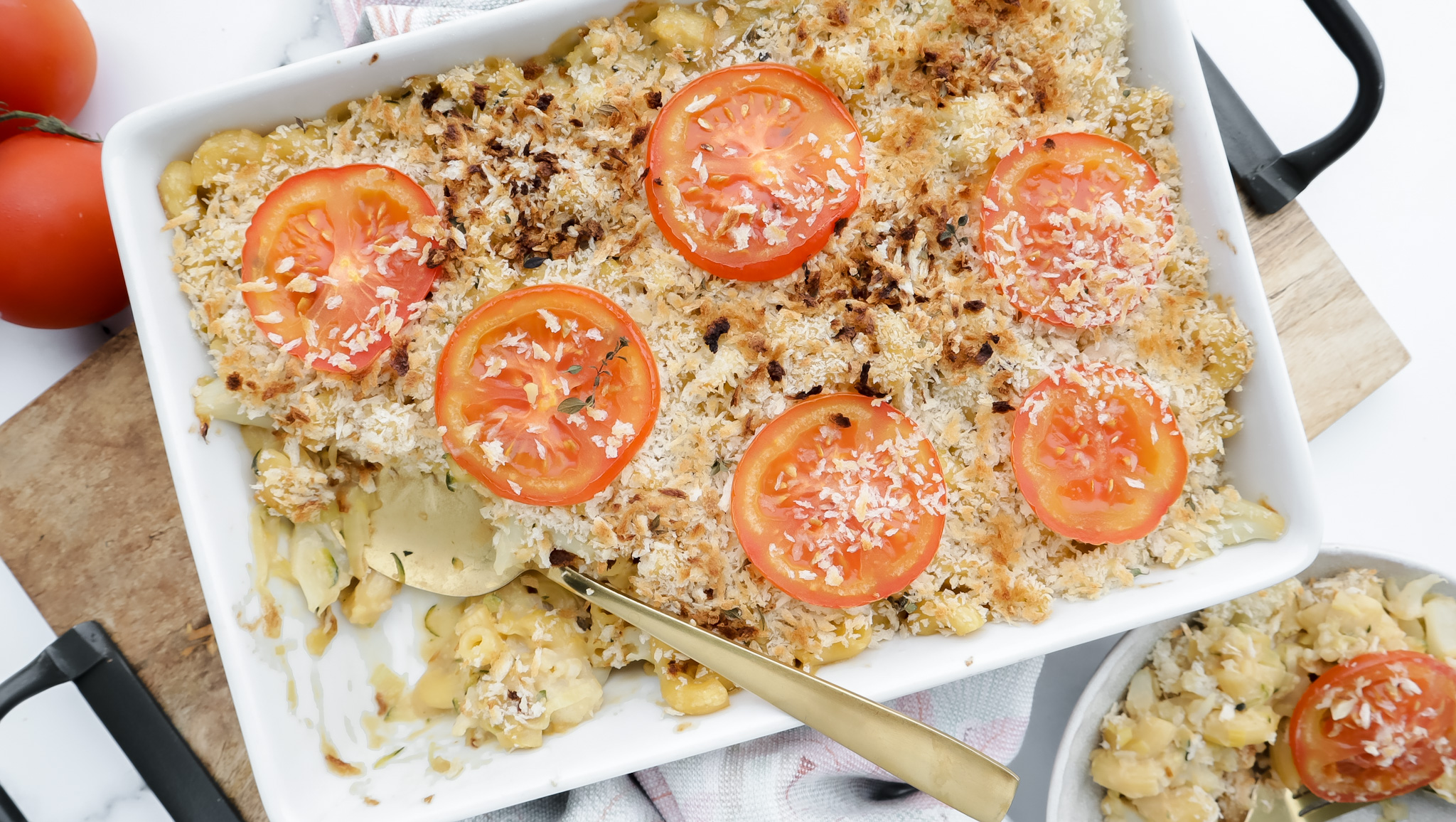 Cauliflower mac & cheese bake with crumb & tomato topping recipe family meal plans
