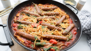 Pork & sausage pasta with cherry tomato sauce & parmesan cheese meal planning