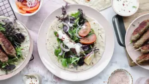 Turkish lamb kofta kebabs with salad & yoghurt sauce recipe Family-Friendly Meal Planning Subscription Weekly Shoppable Dinner Recipes Easy Meal Plans with Shopping Lists