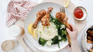 Southern style chicken drumsticks with potato mash & steamed vegetables meal planning
